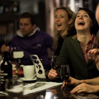 drunk-happy-wine-drinkers-at-a-table