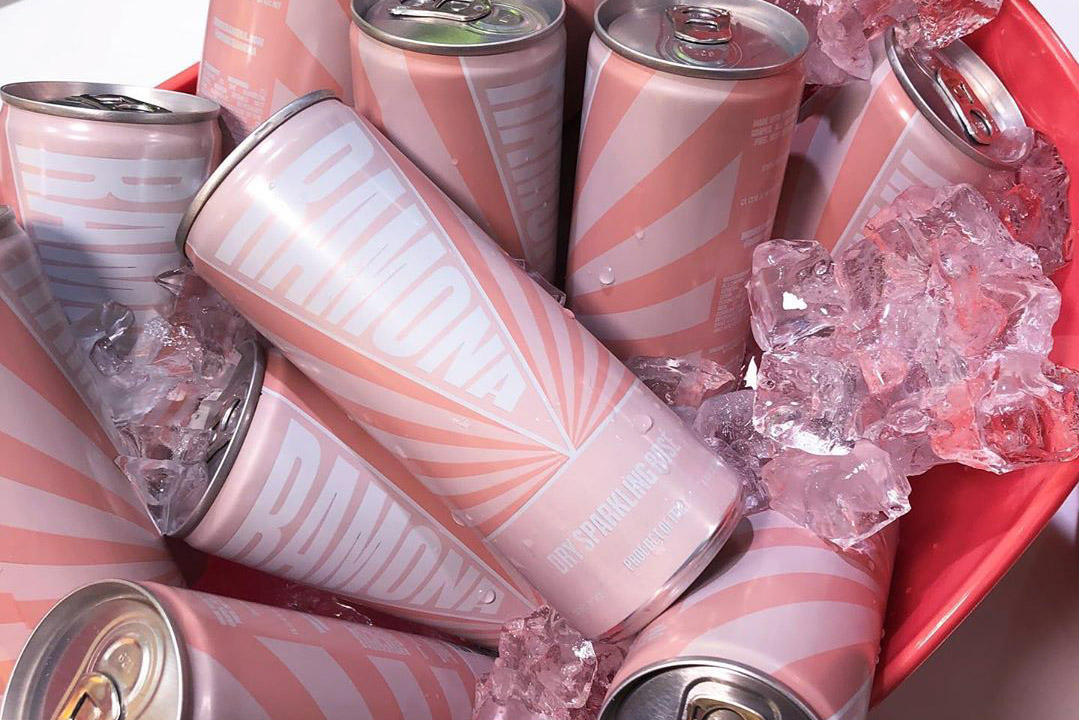 Cans of Ramona rose in a bucket with ice.