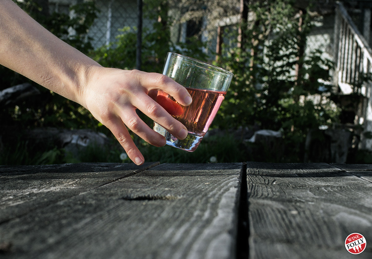 Rose wine in a stemless wine glass