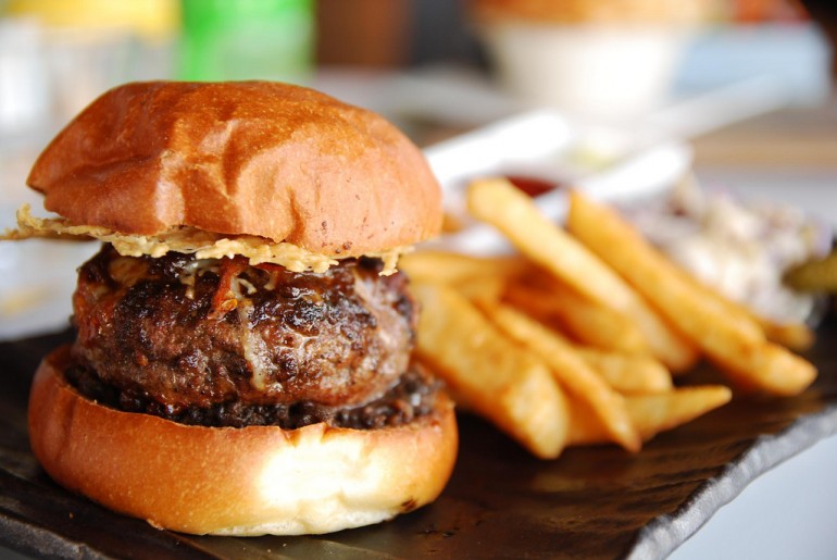 Umami Burger with gruyere, brown mushroom sauce, caramelised onions at NSHERY in Melbourne, Australia