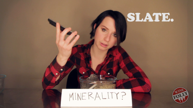 Madeline Puckette holding a Slate Rock Getting serious about minerals in wine